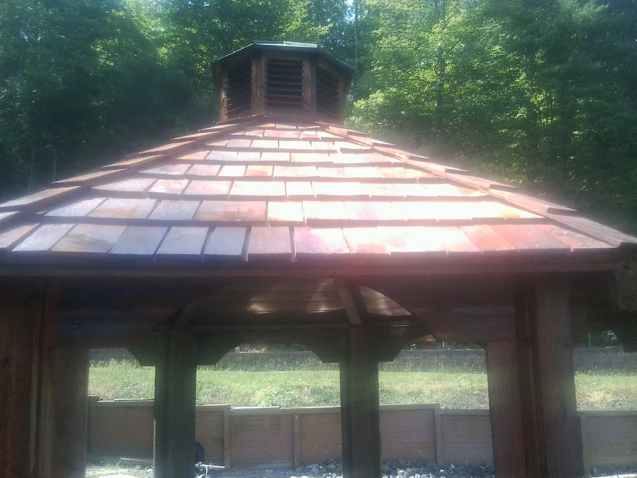 New cedar shake roof and cupola on a lakeside gazebo in Curwensville